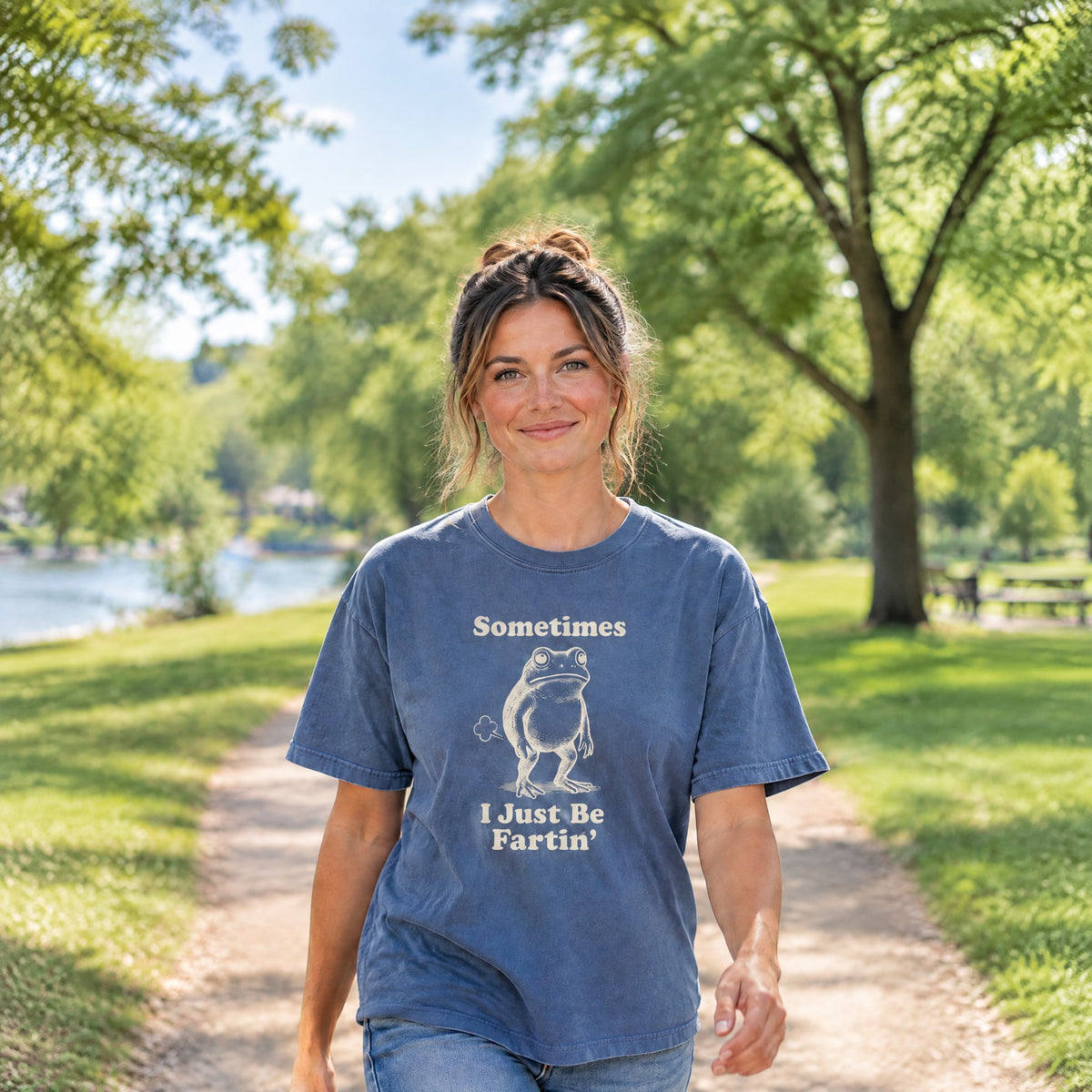 Person wearing a Blue Jean Comfort Colors Sometimes I Just Be Fartin funny frog tee