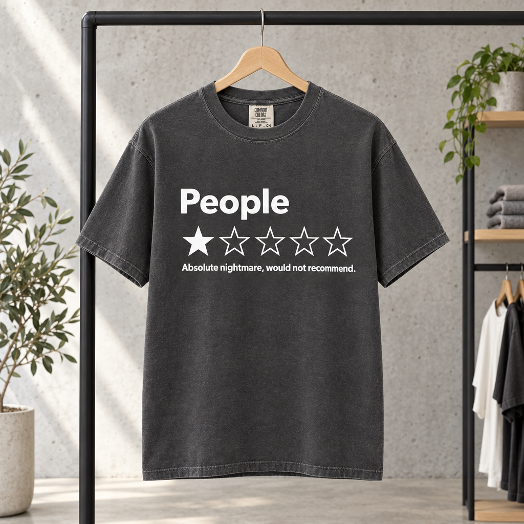 Funny antisocial introvert Comfort Colors shirt in Pepper on a clothing rack