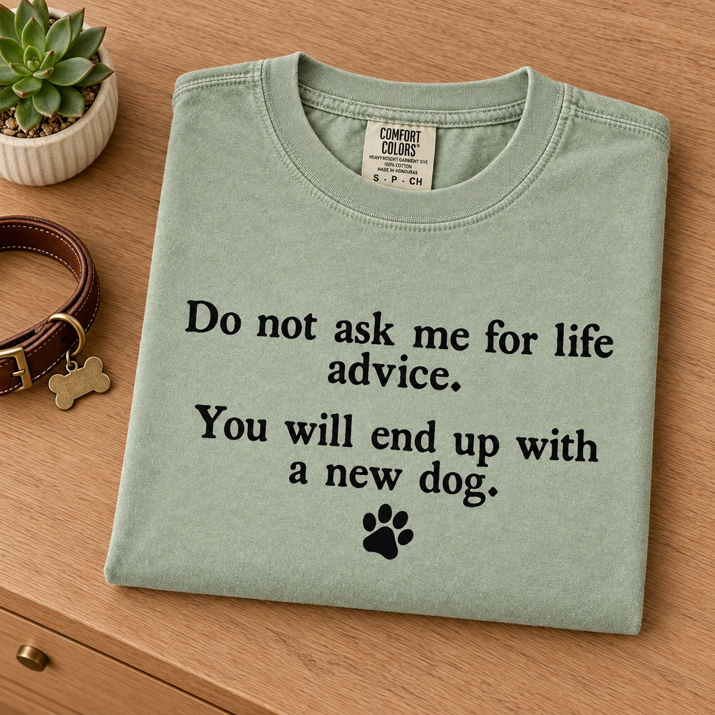 Funny dog quote Comfort Colors tee in Light Green, folded with a dog collar
