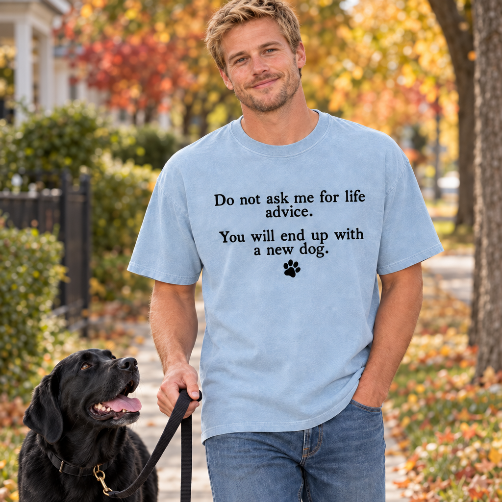 Man in a Chambray Comfort Colors dog dad shirt walking his black labrador
