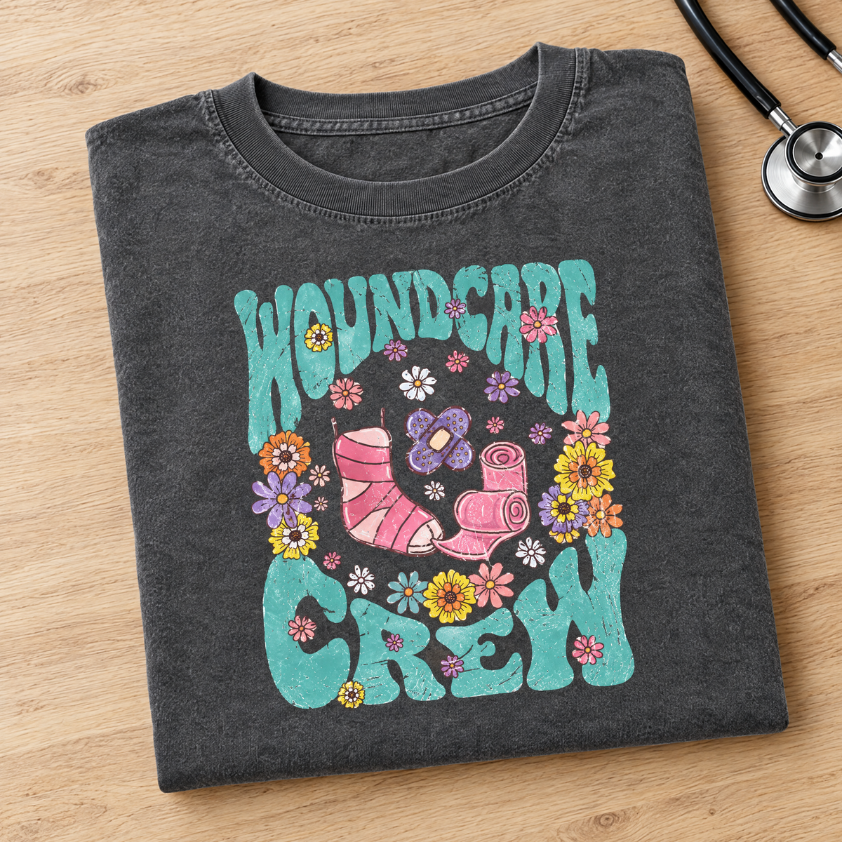 Wound Care Crew Comfort Colors tee in Pepper, neatly folded