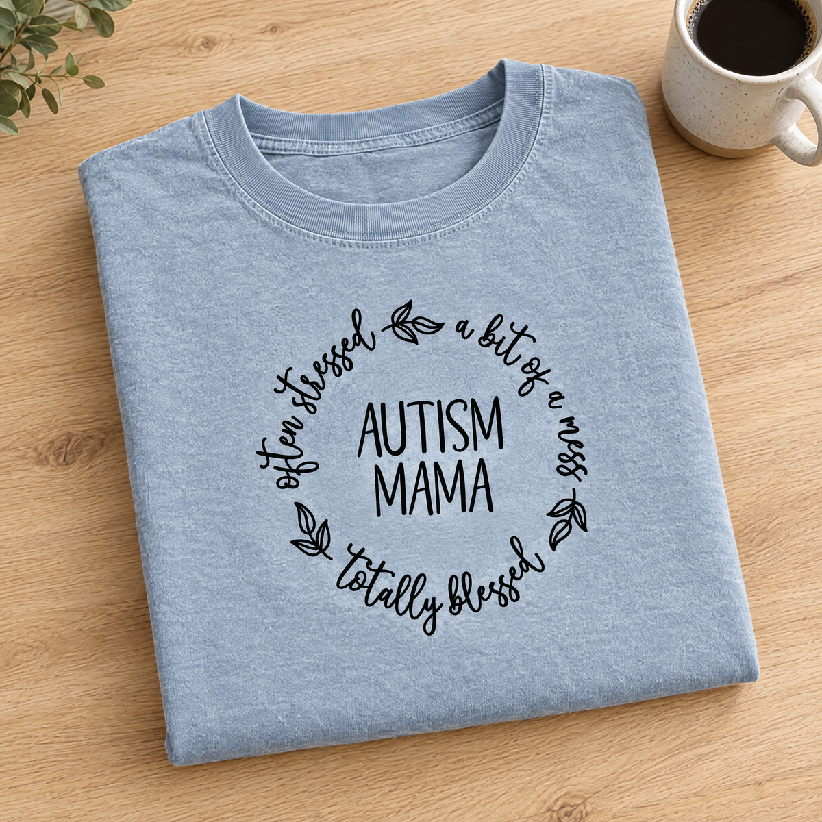 Autism Mama Comfort Colors tee in Chambray, neatly folded