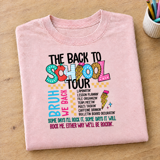 Back to School Tour Comfort Colors tee in Blossom pink, neatly folded