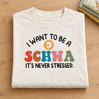 I Want To Be A Schwa shirt in Ivory Comfort Colors, neatly folded