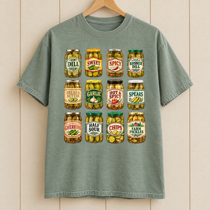Pickle jar shirt in Sage Comfort Colors, on a wooden hanger