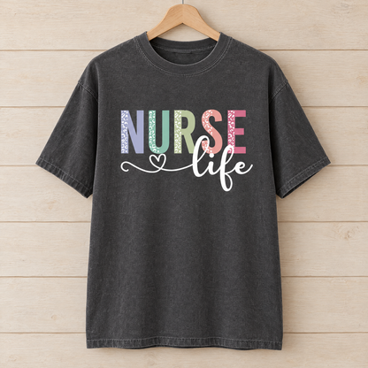 Nurse Life shirt in Pepper Comfort Colors, on a wooden hanger