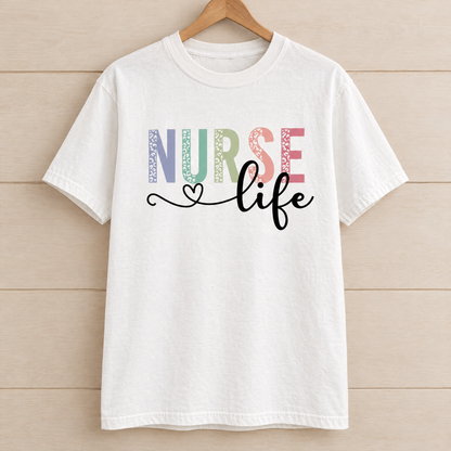 Nurse Life shirt in White Comfort Colors, on a wooden hanger