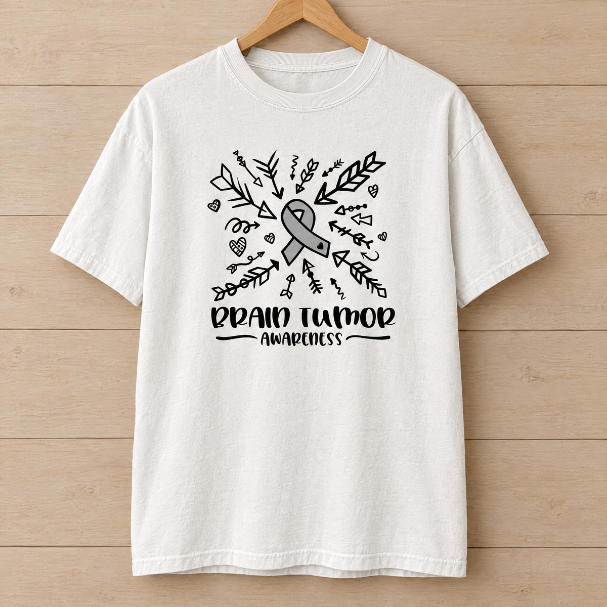 Brain Tumor Awareness shirt in White Comfort Colors, on a wooden hanger