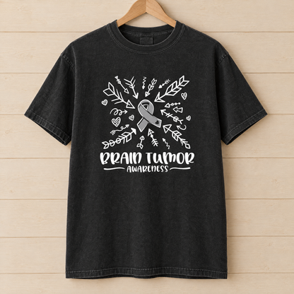 Brain Tumor Awareness shirt in Black Comfort Colors, on a wooden hanger