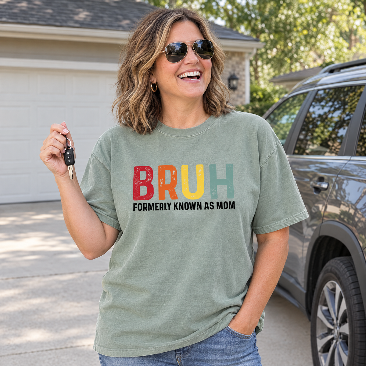 Bruh Formerly Known As Mom shirt in Sage Comfort Colors, worn by a model