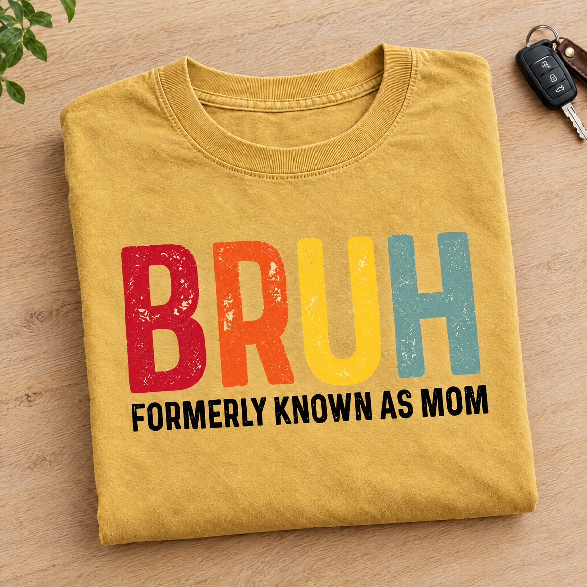 Bruh Formerly Known As Mom shirt in Mustard Comfort Colors, neatly folded