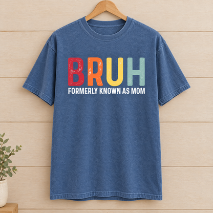 Bruh Formerly Known As Mom shirt in Blue Jean Comfort Colors, on a wooden hanger