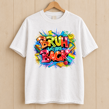 Bruh We Are Back shirt in White Comfort Colors, on a wooden hanger