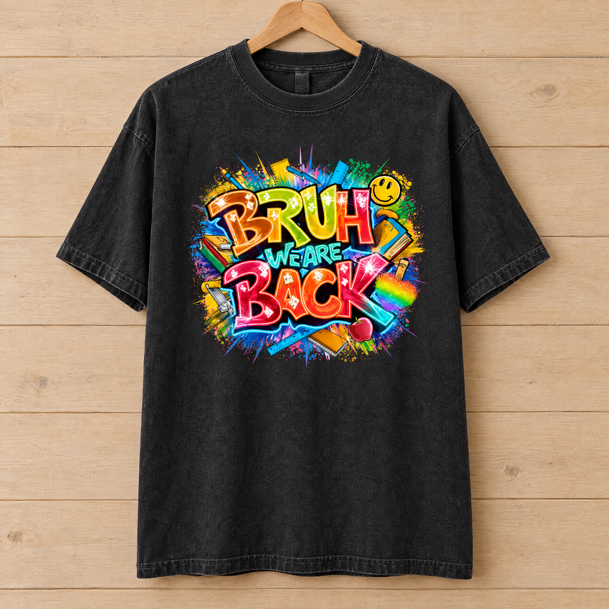 Bruh We Are Back shirt in Black Comfort Colors, on a wooden hanger