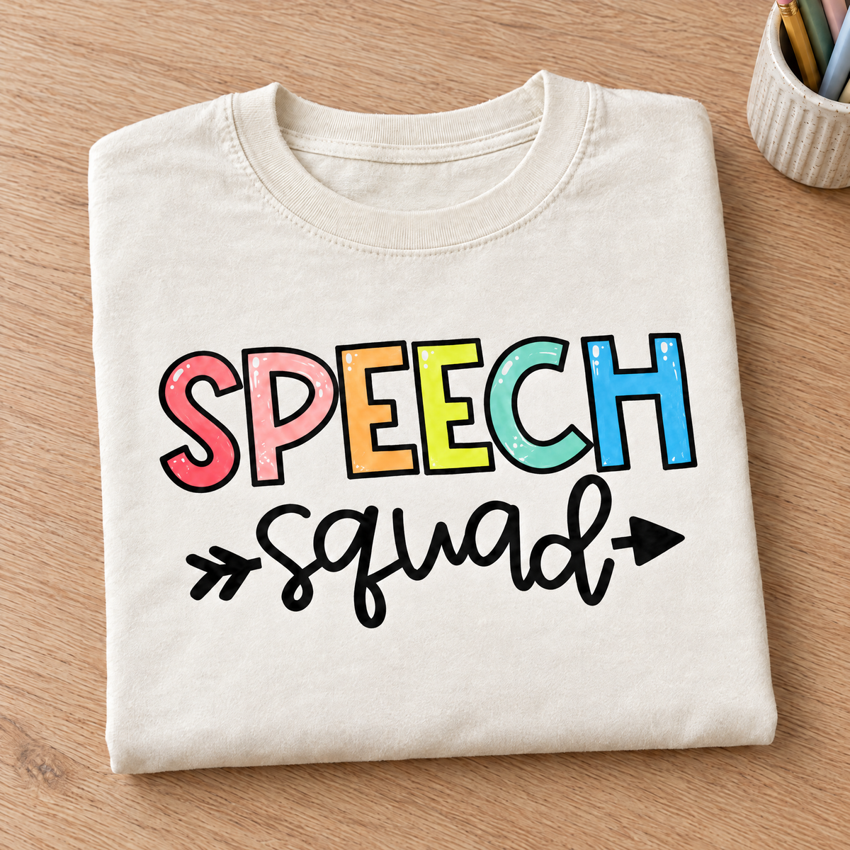 Speech Squad shirt in Ivory Comfort Colors, neatly folded