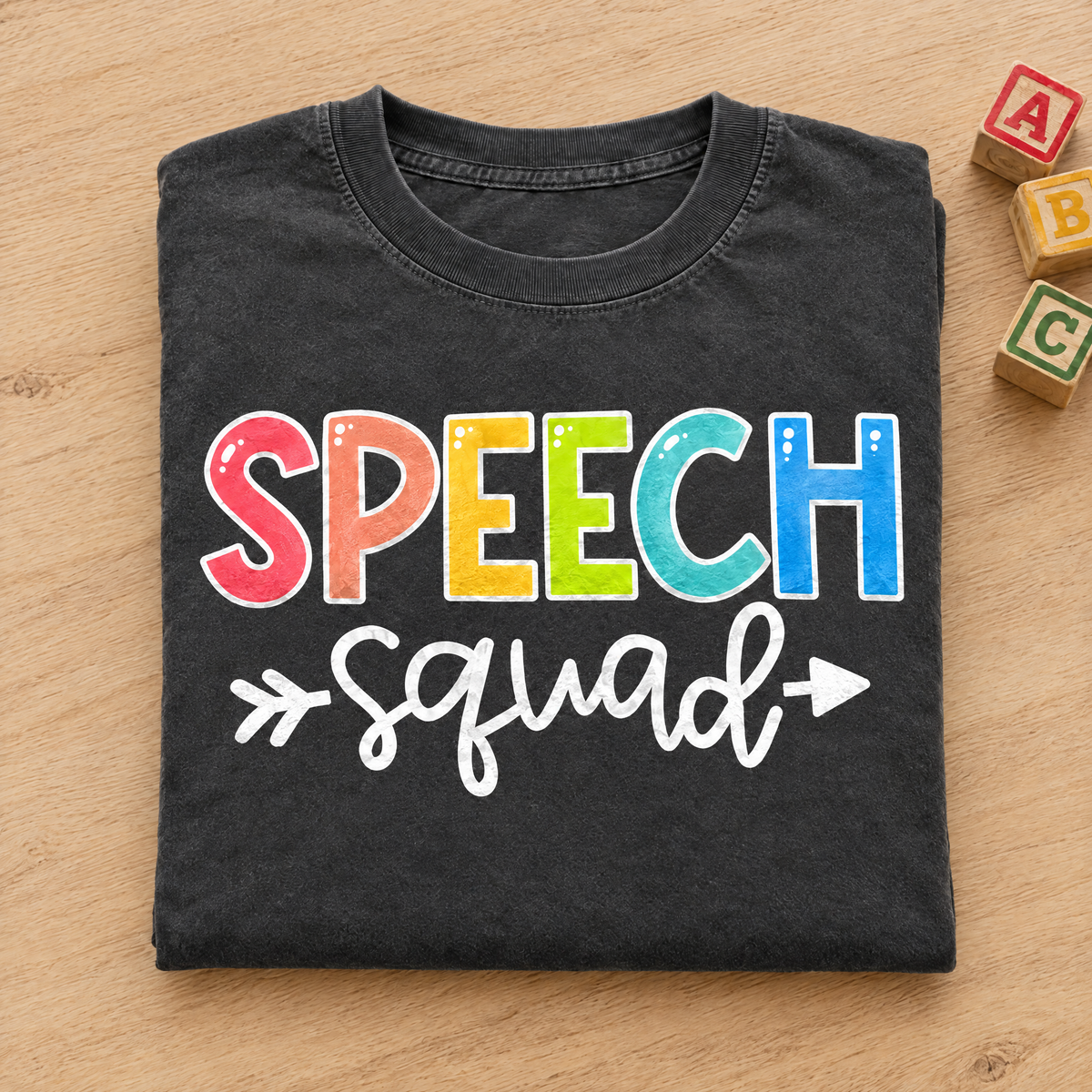 Speech Squad shirt in Pepper Comfort Colors, neatly folded