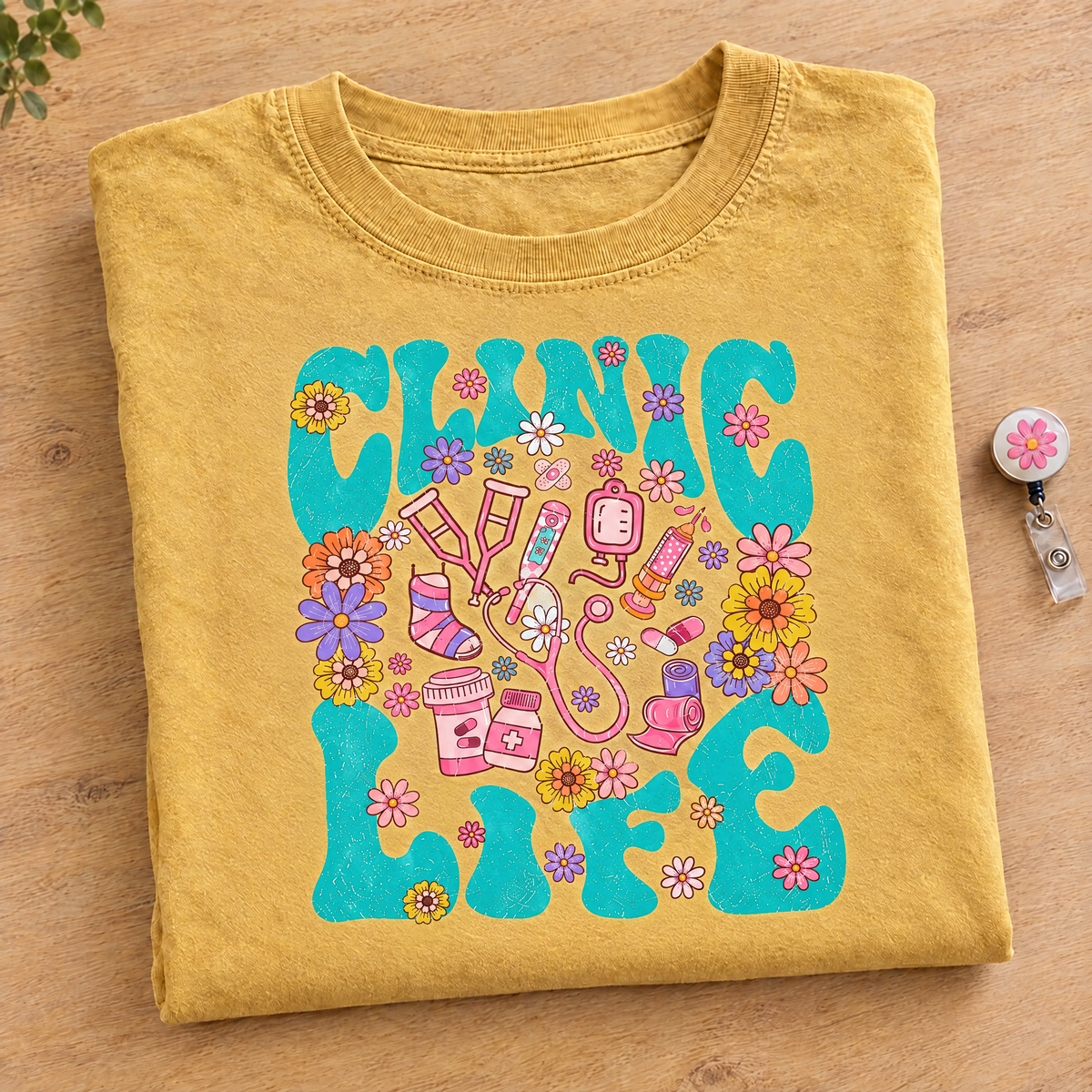Clinic Life shirt in Mustard Comfort Colors, neatly folded