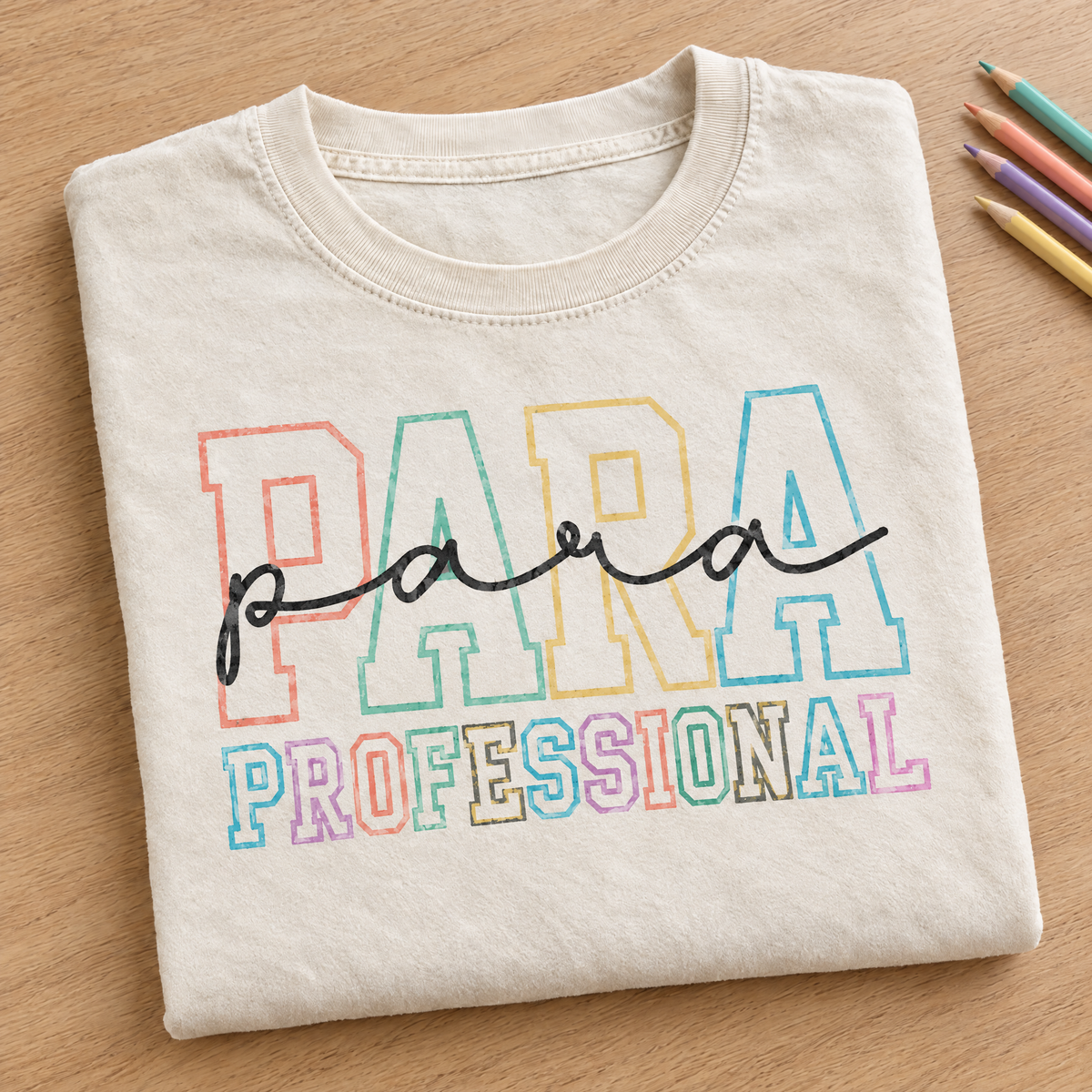 Paraprofessional shirt in Ivory Comfort Colors, neatly folded