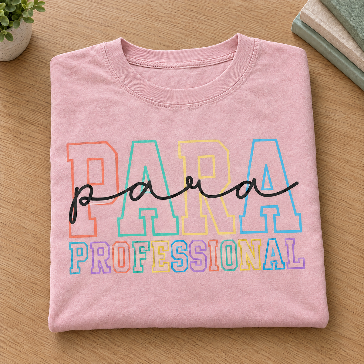 Paraprofessional shirt in Blossom Comfort Colors, neatly folded