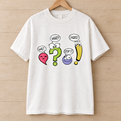 Punctuation shirt in White Comfort Colors, on a wooden hanger