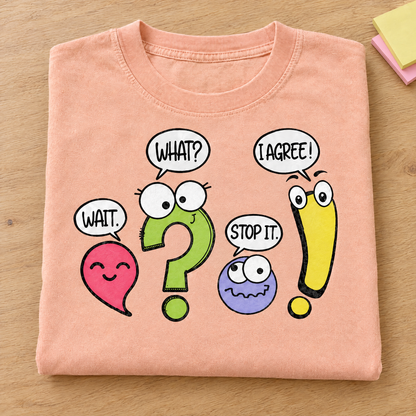 Punctuation shirt in Peachy Comfort Colors, neatly folded