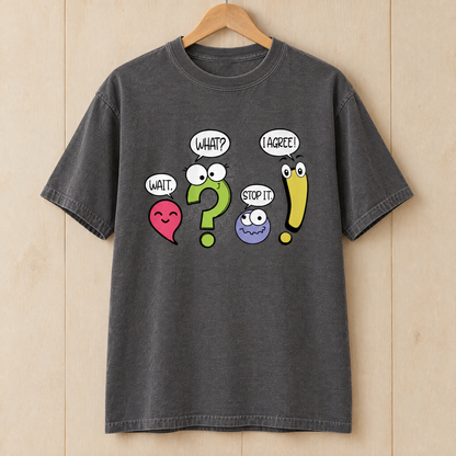 Punctuation shirt in Pepper Comfort Colors, on a wooden hanger