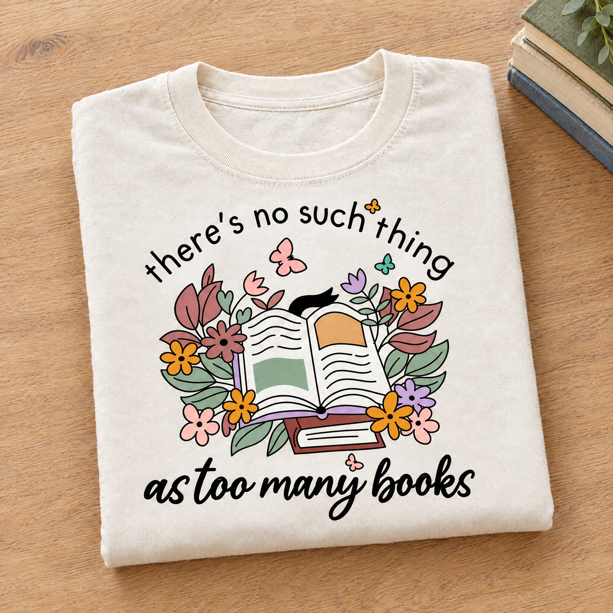 Too Many Books shirt in Ivory Comfort Colors, neatly folded