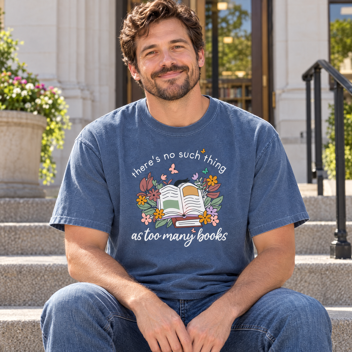 Too Many Books shirt in Blue Jean Comfort Colors, worn by a seated model