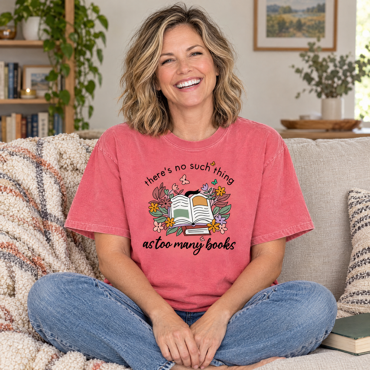 Too Many Books shirt in Watermelon Comfort Colors, worn by a seated model