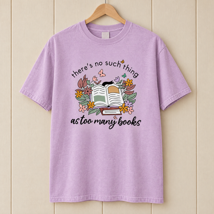 Too Many Books shirt in Orchid Comfort Colors, on a wooden hanger