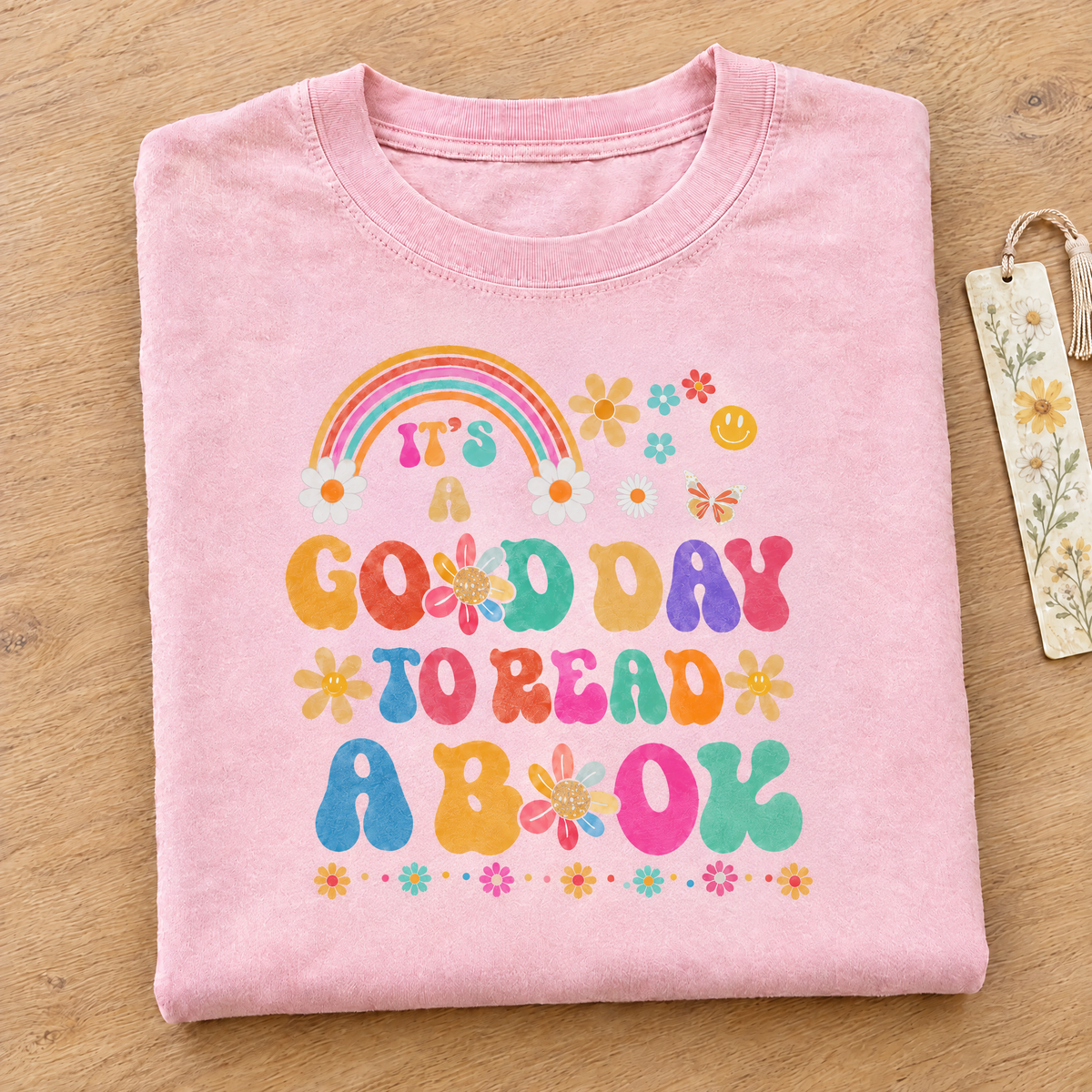 Good Day To Read A Book shirt in Blossom Comfort Colors, neatly folded