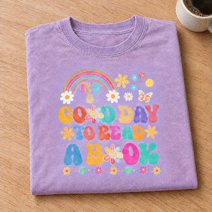 Good Day To Read A Book shirt in Orchid Comfort Colors, neatly folded