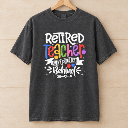 Retired Teacher shirt in Pepper Comfort Colors, on a wooden hanger
