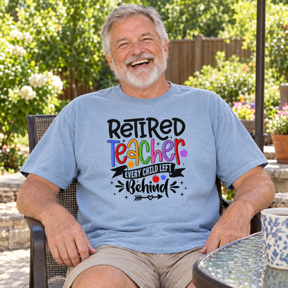 Retired Teacher shirt in Chambray Comfort Colors, worn by a seated model