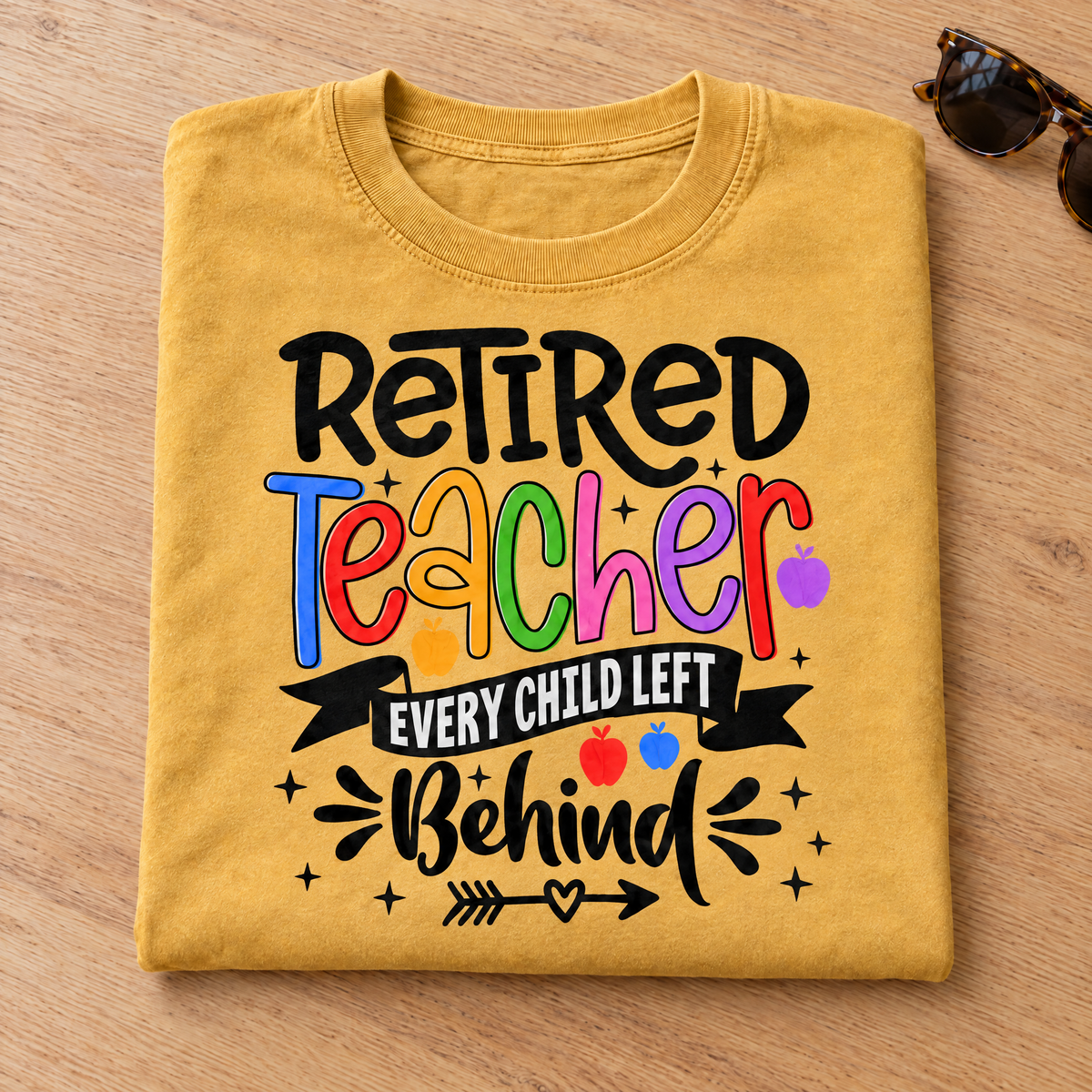 Retired Teacher shirt in Mustard Comfort Colors, neatly folded