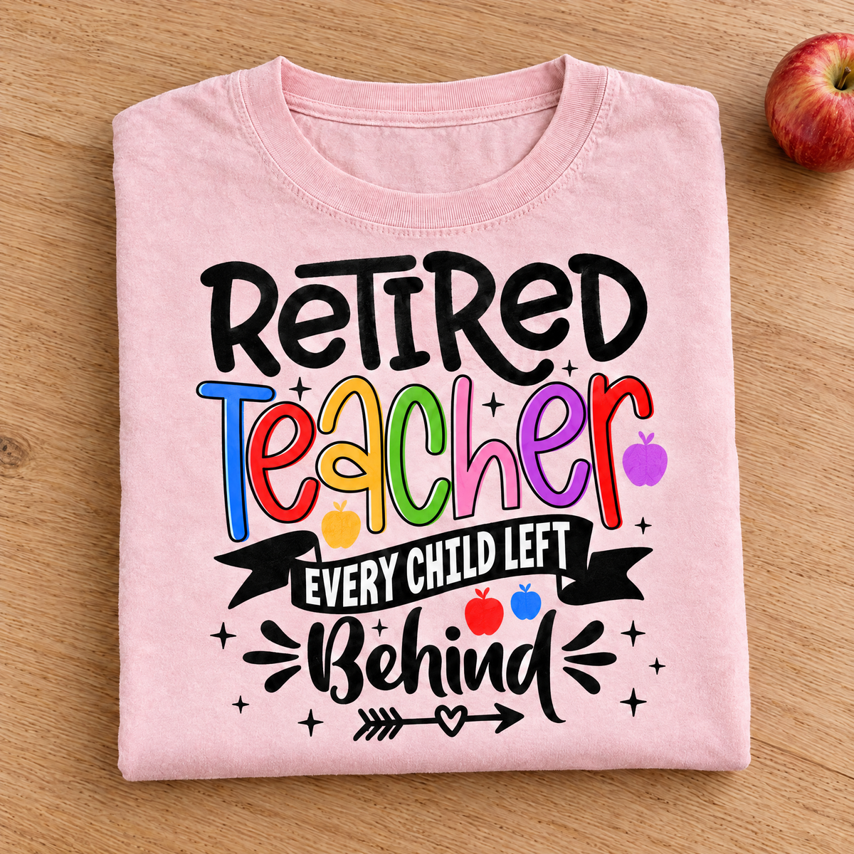 Retired Teacher shirt in Blossom Comfort Colors, neatly folded