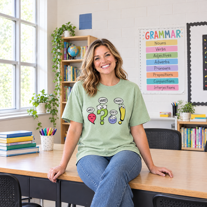 Punctuation shirt in Light Green Comfort Colors, worn by a seated model