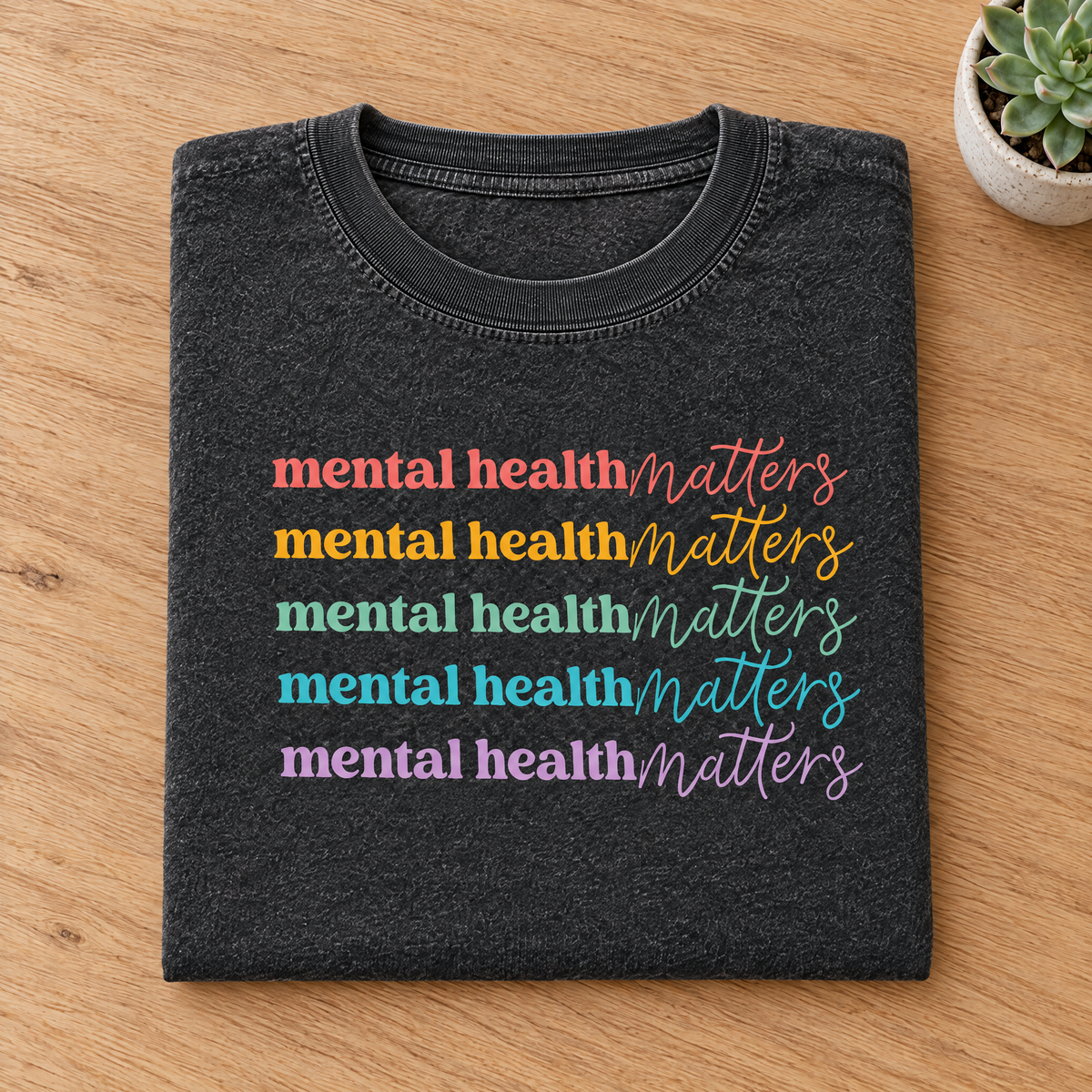 Mental Health Matters rainbow shirt in Pepper Comfort Colors neatly folded