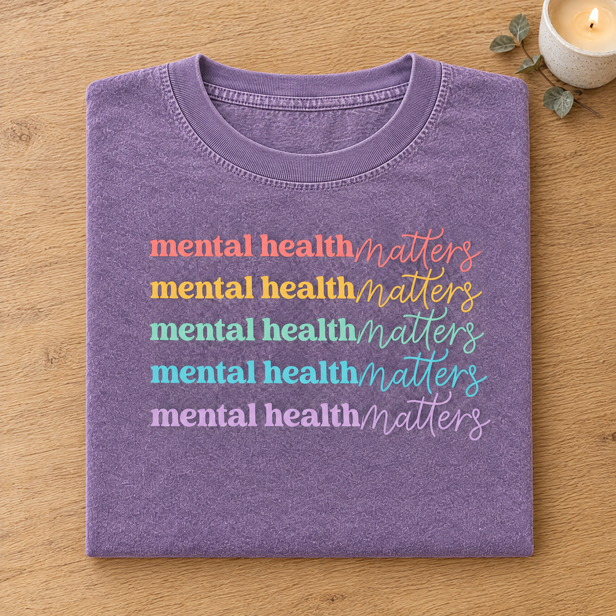 Mental Health Matters rainbow shirt in Orchid Comfort Colors neatly folded