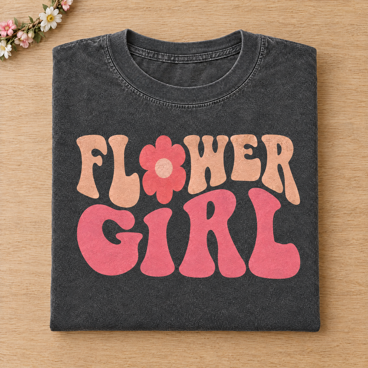 Flower Girl retro groovy shirt in Pepper Comfort Colors neatly folded