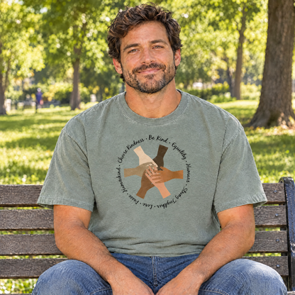 Choose Kindness diverse hands circle shirt in Sage Comfort Colors, man sitting on a park bench