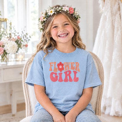 Flower Girl retro groovy shirt in Chambray Comfort Colors, little girl with a flower crown sitting in a bridal getting-ready room