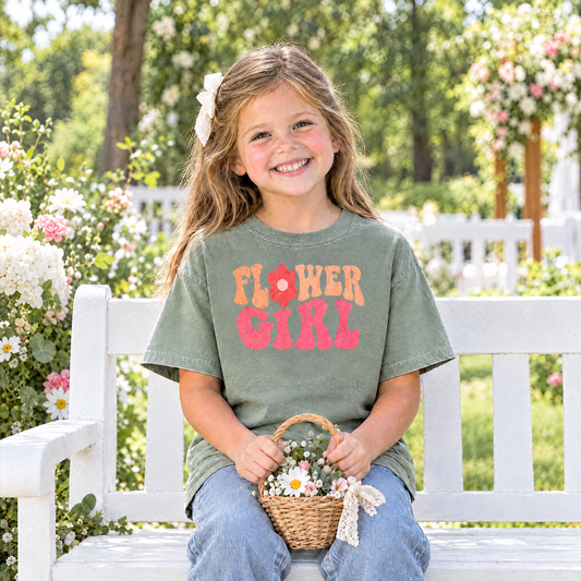 Flower Girl retro groovy shirt in Sage Comfort Colors, little girl flower girl sitting on a garden bench with a flower basket
