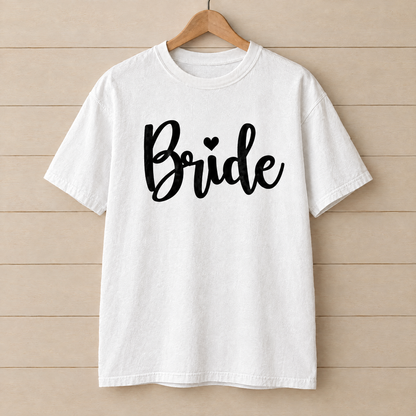 Bride shirt in White Comfort Colors on a wooden hanger