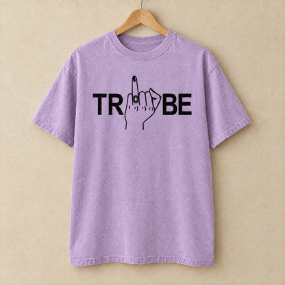 Tribe shirt in Orchid Comfort Colors on a wooden hanger