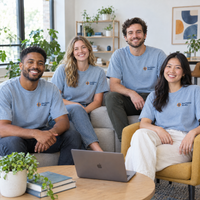 Office team in matching Chambray Comfort Colors shirts with a custom colorful pocket logo print