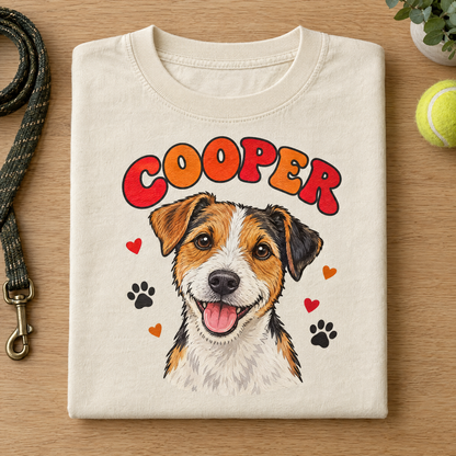 Custom dog portrait shirt in Natural Ivory Comfort Colors with a cartoon Jack Russell named Cooper, neatly folded