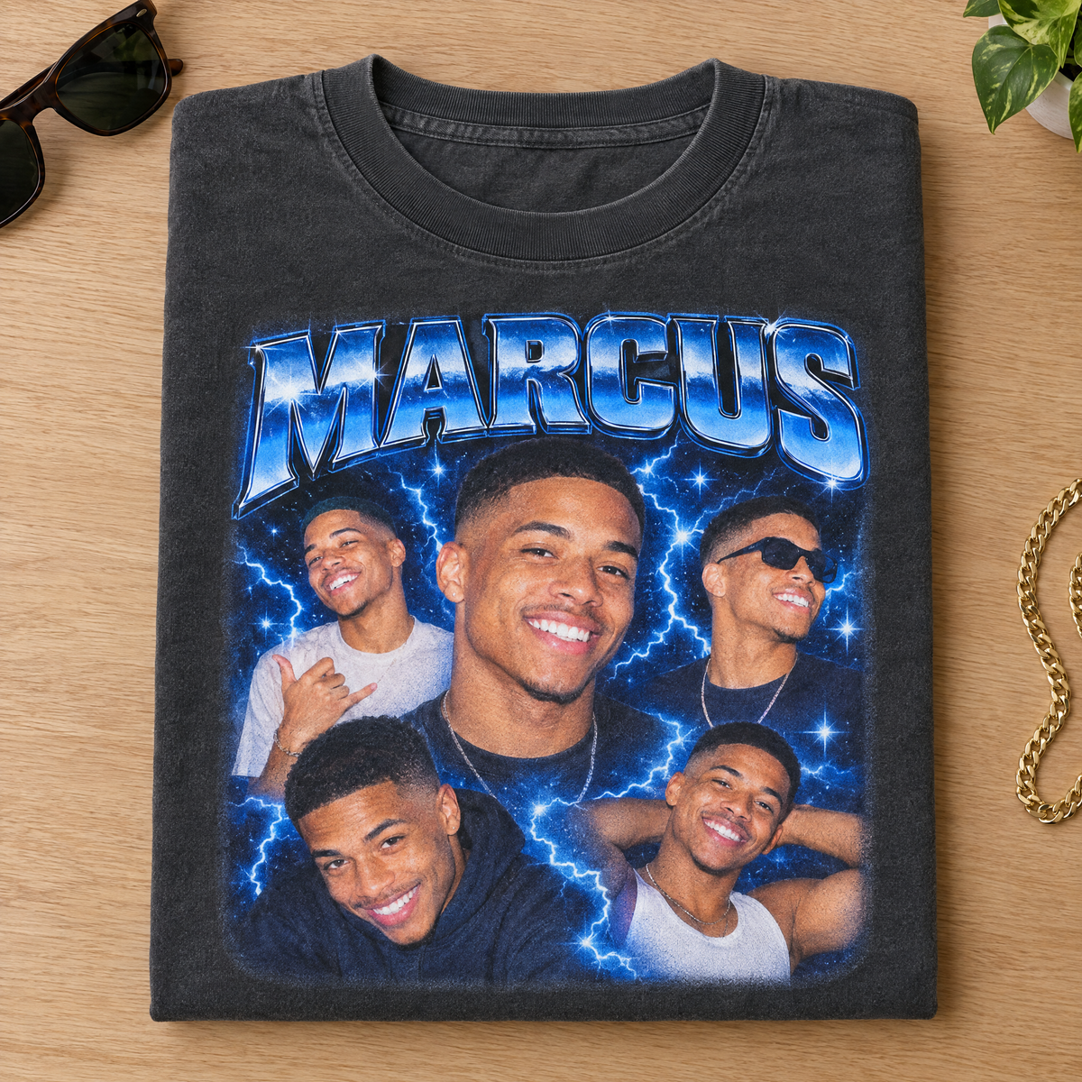 Custom bootleg shirt in Pepper Comfort Colors with a chrome blue lightning photo collage of Marcus, neatly folded