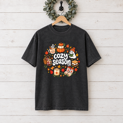 Cozy Season fall Comfort Colors shirt in Black on a wooden hanger