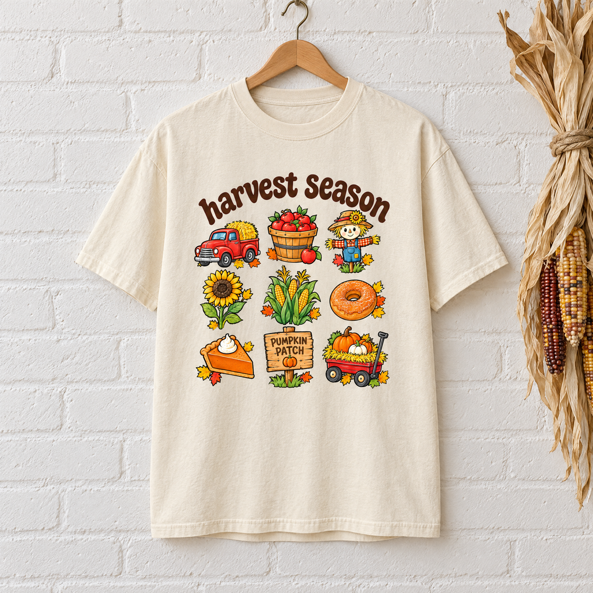 Harvest Season Comfort Colors shirt in Natural Ivory on a wooden hanger